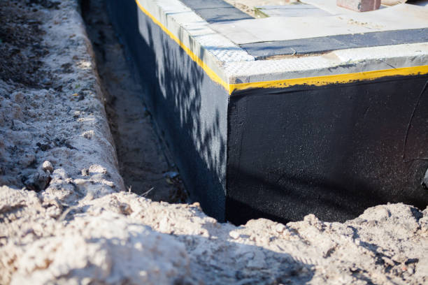 Professional Exterior Waterproofing technician working in Exton, PA